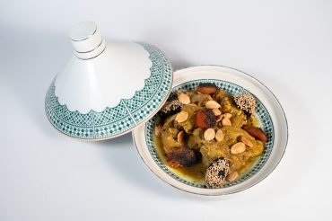 Authentic Moroccan Lamb Tajine with Prunes and Roasted Almonds at Beity Ibn Rushd.